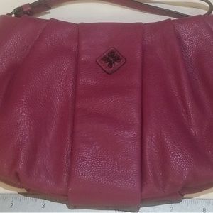 Vera Wang WRISTLET in a pinkish purple vibrant color